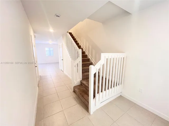 a view of a hallway with entryway