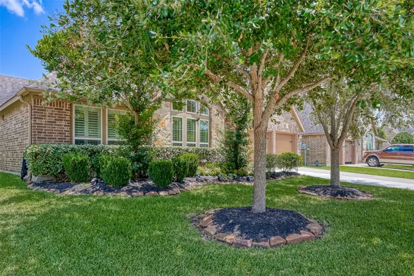 a house view with a garden space
