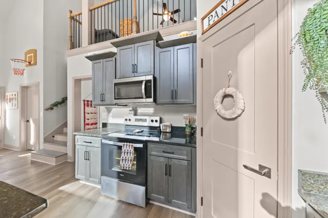 a bedroom with furniture and a bed