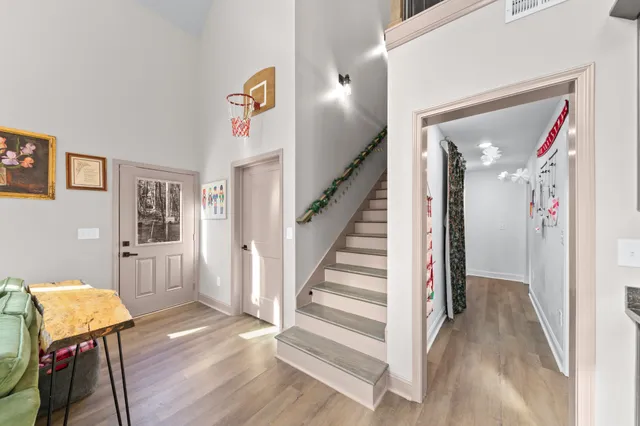 a living room with furniture and a rug