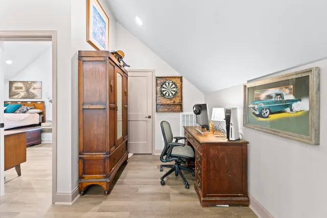 a view of a park with large trees