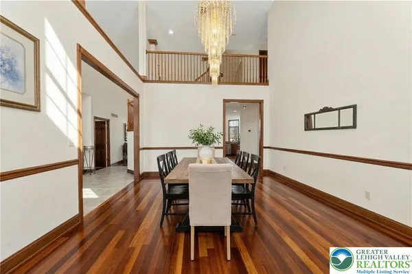 a living room with furniture rug and window