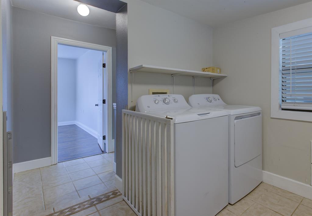 209 Case Street Weatherford, TX 76086 - Photo 12 of 25 laundry with storage
