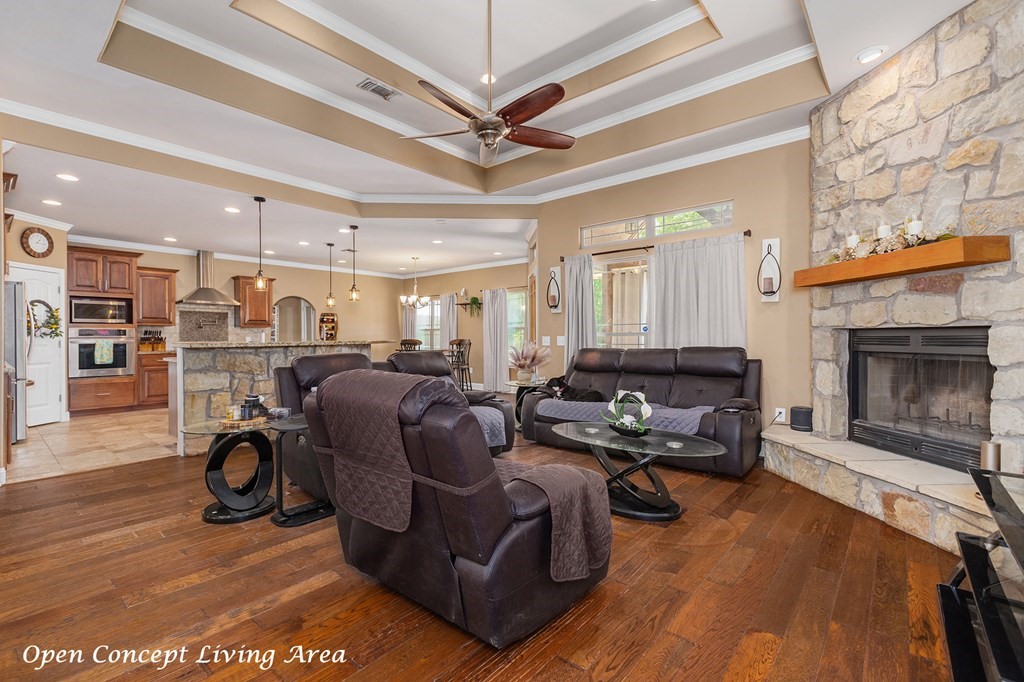 1171 Old Ewing Road Lufkin, TX 75901 - Photo 3 of 49 a living room with furniture gym equipment and a fireplace