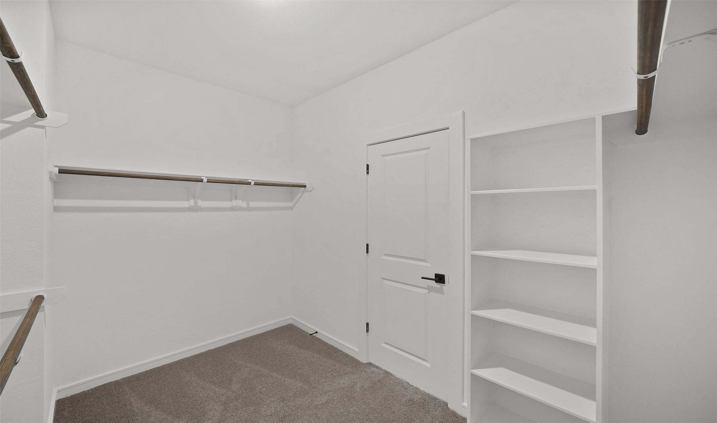 29307 Suncreek Rnch Court Waller, TX 77484 - Photo 14 of 21 Spacious walk-in closet in primary suite (*Photo not of actual home and used for illustration purposes only.)