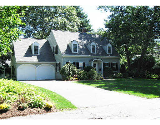 40 Emerson Road Wellesley, MA 02481 - Photo 1 of 9 a front view of house with yard and green space