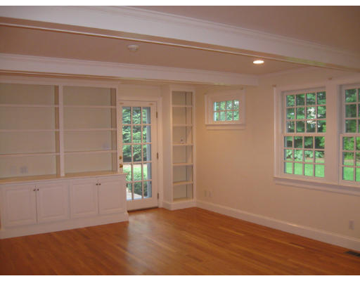 40 Emerson Road Wellesley, MA 02481 - Photo 4 of 9 an empty room with wooden floor and windows