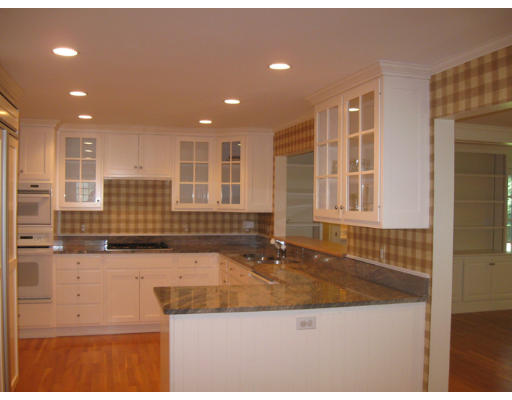 40 Emerson Road Wellesley, MA 02481 - Photo 6 of 9 a kitchen with kitchen island granite countertop a sink and a stove