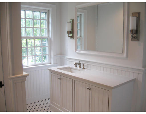 40 Emerson Road Wellesley, MA 02481 - Photo 8 of 9 a bathroom with a sink and a mirror