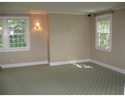 40 Emerson Road Wellesley, MA 02481 - Photo 9 of 9 an empty room with wooden floor and windows
