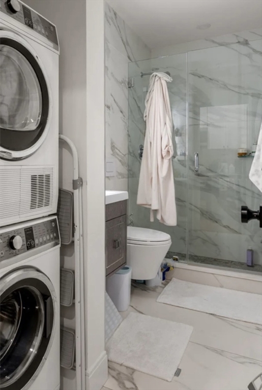 18 Grove Street, Unit 4 Boston, MA 02114 - Photo 12 of 17 a bathroom with a toilet and a bathtub