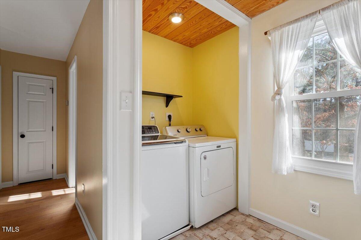 7120 Sandringham Drive Raleigh, NC 27613 - Photo 32 of 40 a view of storage and utility room with a window