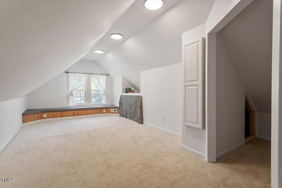 7120 Sandringham Drive Raleigh, NC 27613 - Photo 35 of 40 an empty room with windows and closet