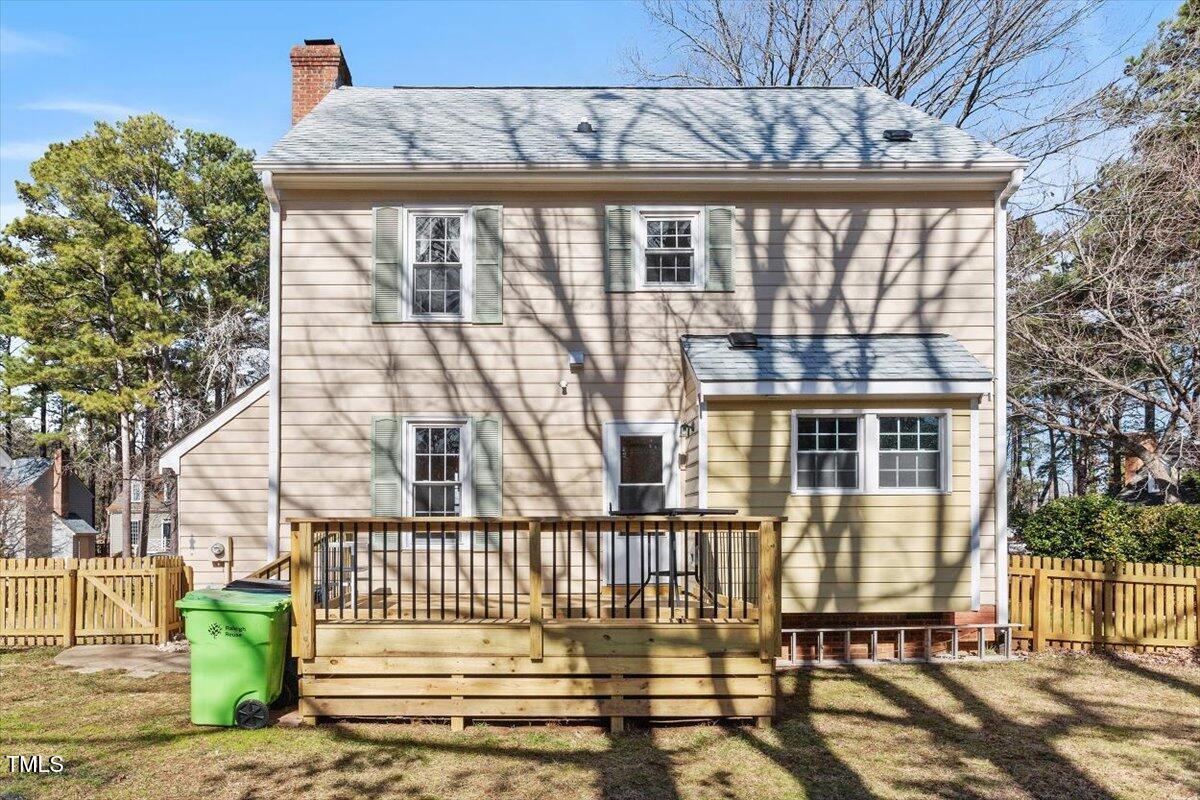7120 Sandringham Drive Raleigh, NC 27613 - Photo 39 of 40 a view of a brick house with a small window
