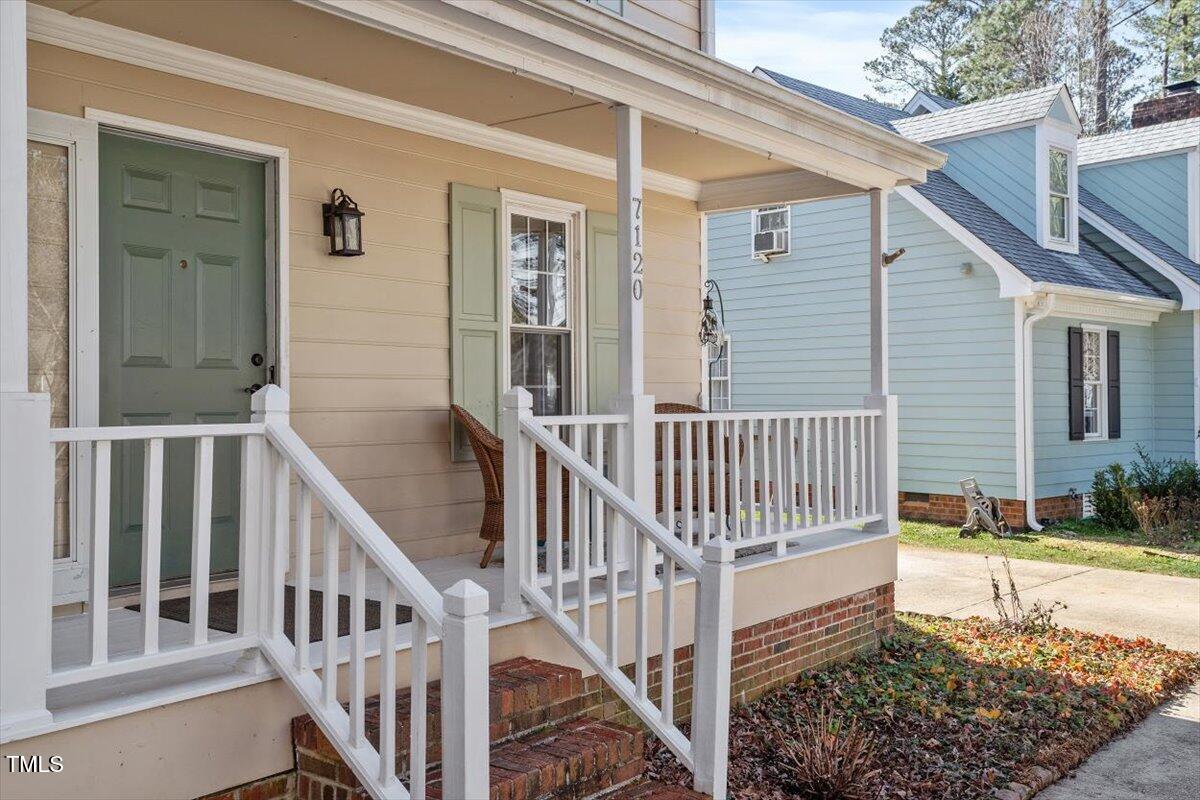 7120 Sandringham Drive Raleigh, NC 27613 - Photo 3 of 40 a view of a house with backyard and deck