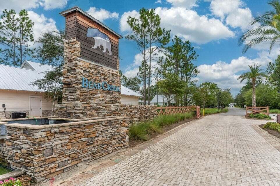 Lot 20 Spirit Bear Way Freeport, FL 32439 - Photo 12 of 21 a backyard of a house with lots of green space