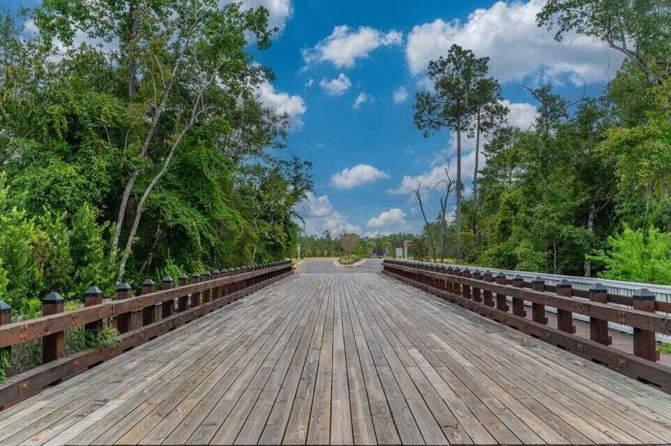 Lot 20 Spirit Bear Way Freeport, FL 32439 - Photo 14 of 21 a view of a balcony with wooden floor