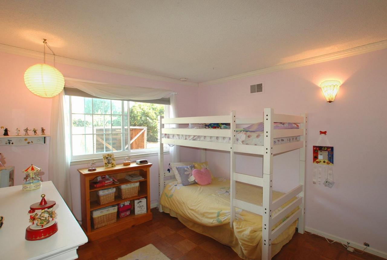 5629 Berkeley Road Goleta, CA 93117 - Photo 6 of 6 a bedroom with a bed and a window