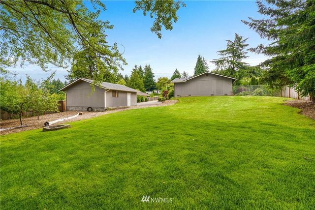 a house view with a garden space