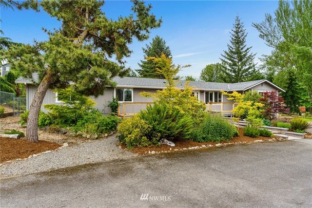 front view of a house with a street