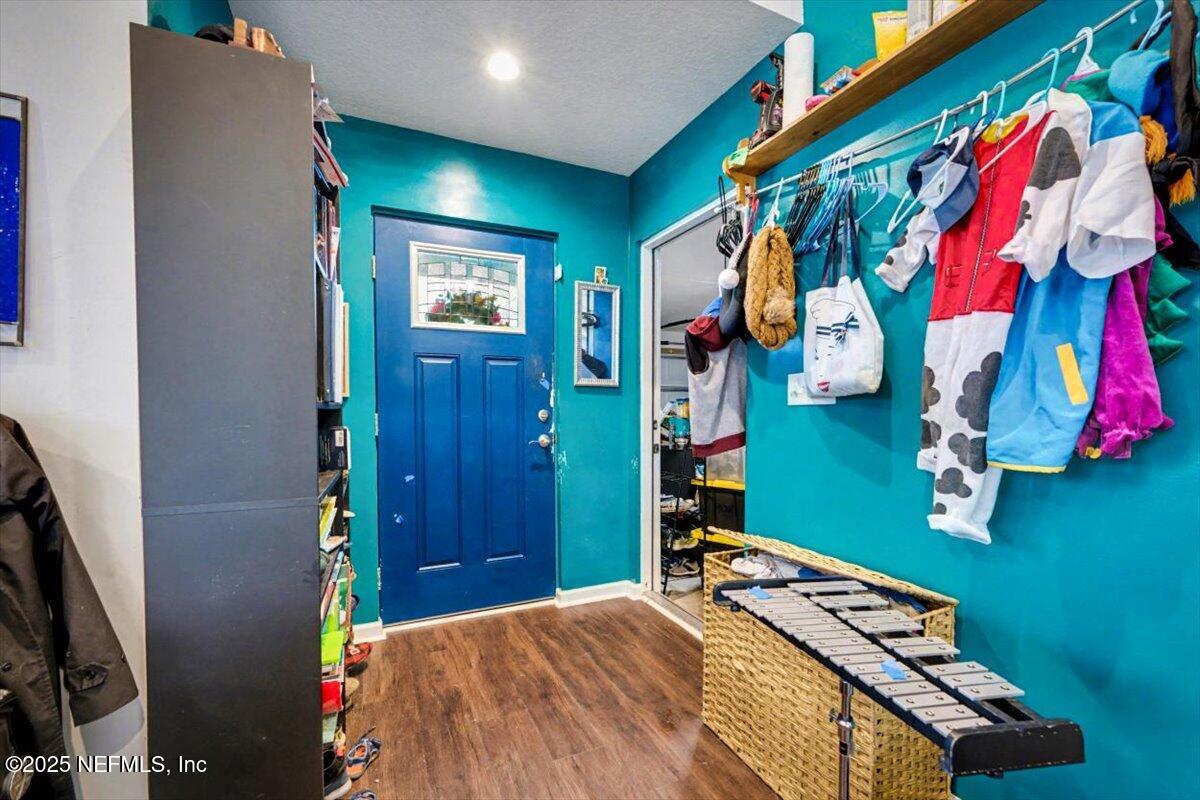 925 Scheidel Way St. Augustine, FL 32084 - Photo 2 of 10 a bed room with a bed and a closet