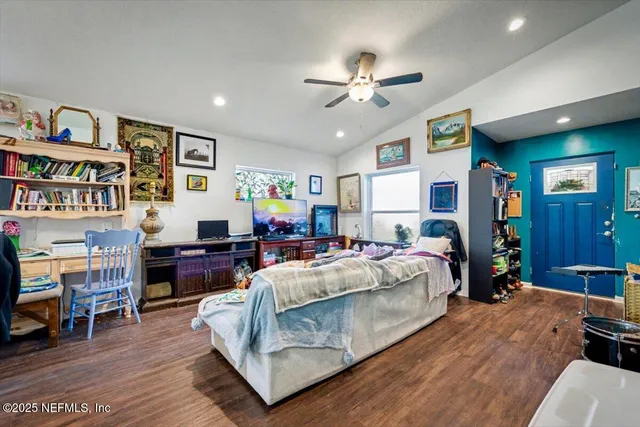 a bed room with bed and window