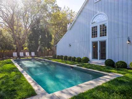a view of backyard with green space