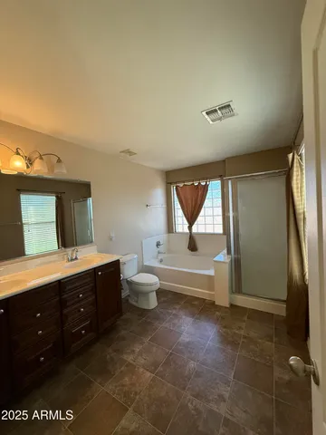 a view of a livingroom with a staircase