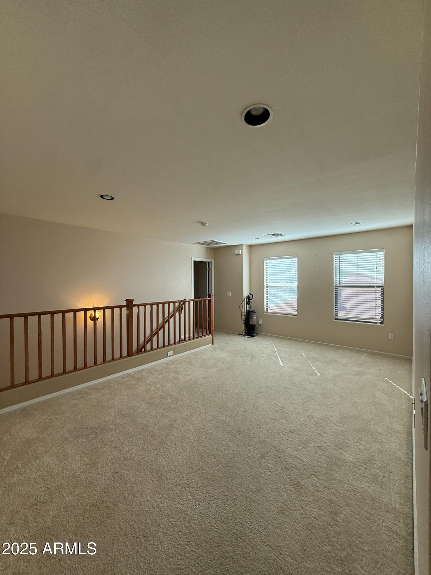 21975 East Vía Del Palo Queen Creek, AZ 85142 - Photo 12 of 19 a view of a livingroom with a staircase