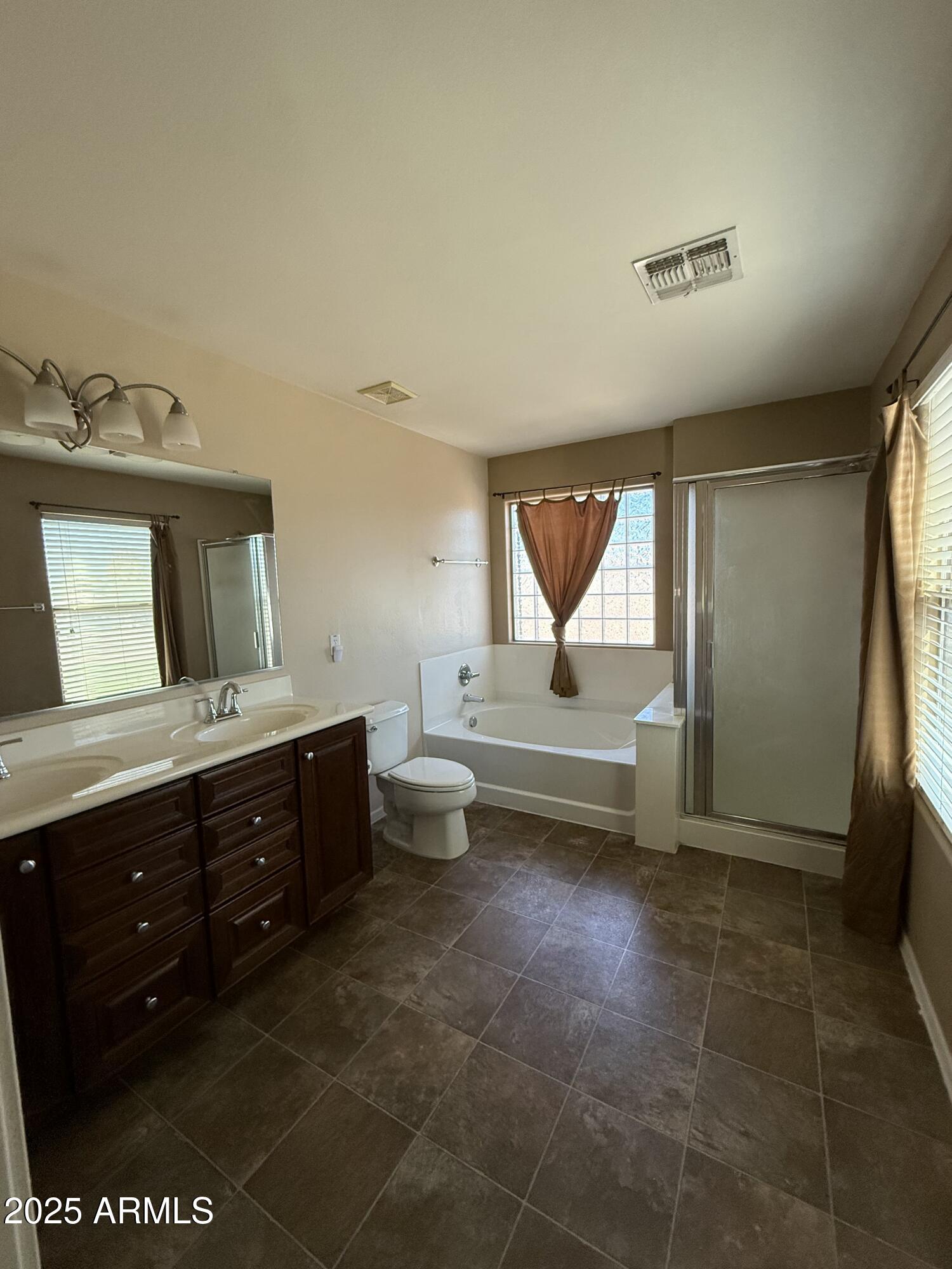 21975 East Vía Del Palo Queen Creek, AZ 85142 - Photo 18 of 19 a room with a baby crib and a dresser
