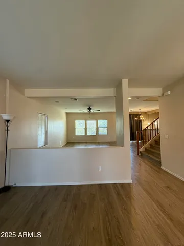 a view of livingroom and hardwood floor