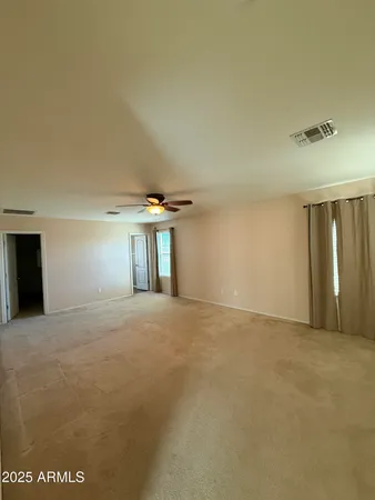 a view of a room with racks on the wall