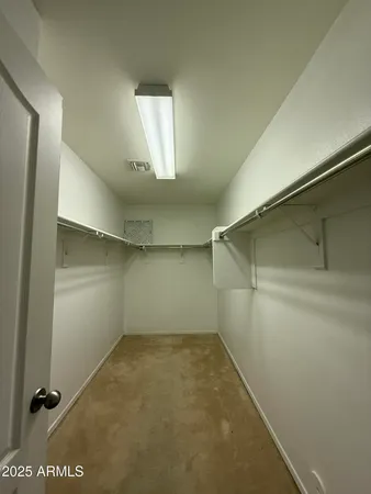 a bathroom with a tub sink toilet and mirror