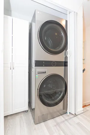 a utility room with dryer and washer