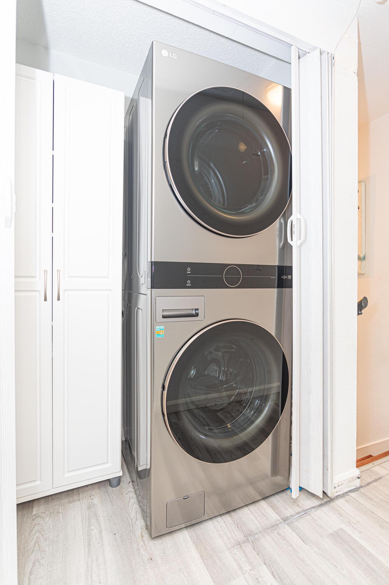 13460 Old Englishtown Road Wellington, FL 33414 - Photo 12 of 15 a utility room with dryer and washer