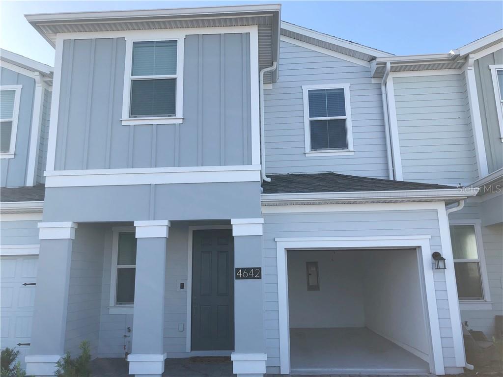 4642 Tribute Trail Kissimmee, FL 34746 - Photo 1 of 1 a front view of a house