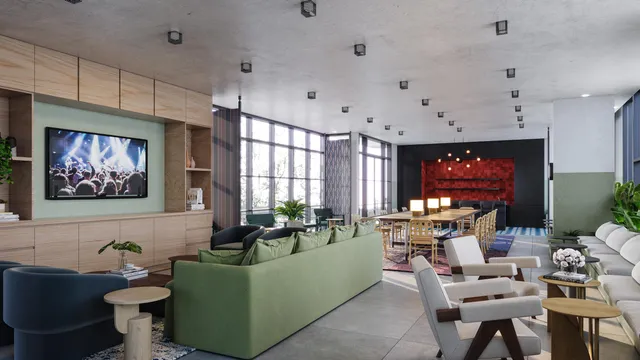 a view of a livingroom with furniture and a potted plant