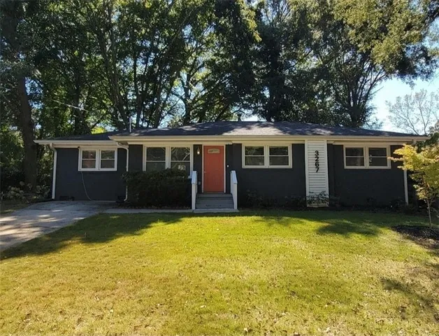 a view of a house with swimming pool
