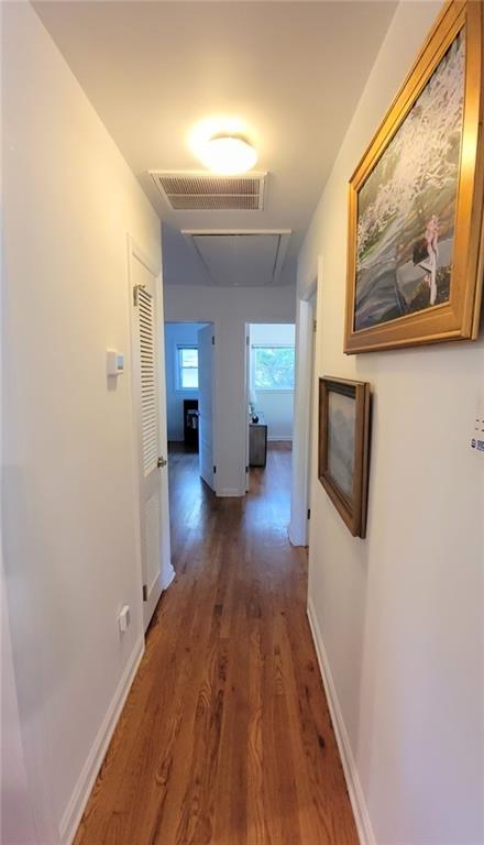 3267 Bonway Drive Decatur, GA 30032 - Photo 16 of 21 a view of a hallway with wooden floor and workspace