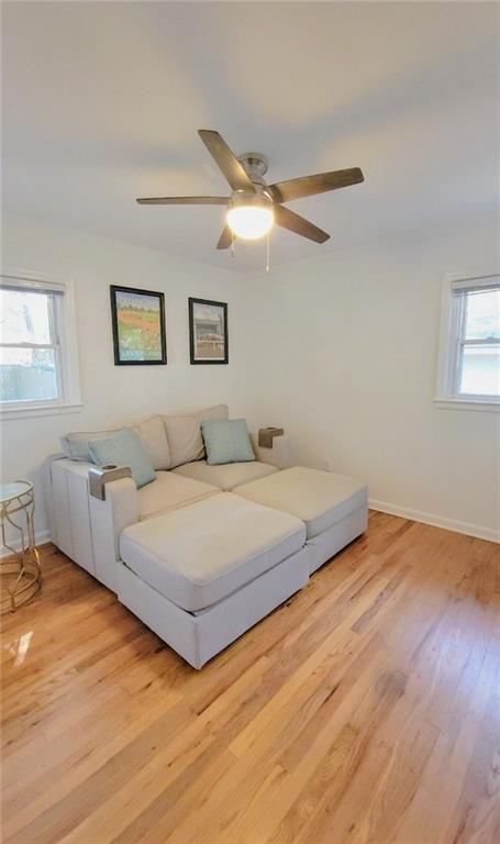 3267 Bonway Drive Decatur, GA 30032 - Photo 19 of 21 a bedroom with a large bed and a ceiling fan