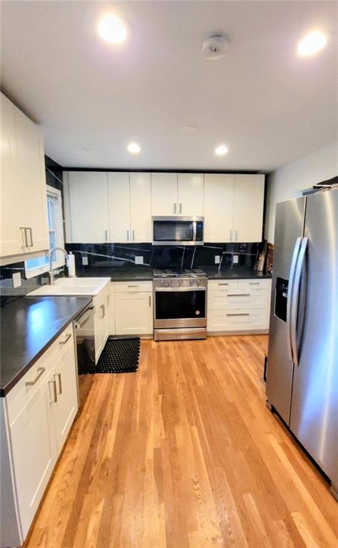 3267 Bonway Drive Decatur, GA 30032 - Photo 4 of 21 a large kitchen with granite countertop a large counter top stainless steel appliances and cabinets