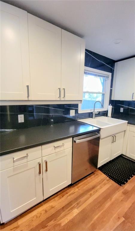 3267 Bonway Drive Decatur, GA 30032 - Photo 6 of 21 a kitchen with stainless steel appliances a sink dishwasher and white cabinets