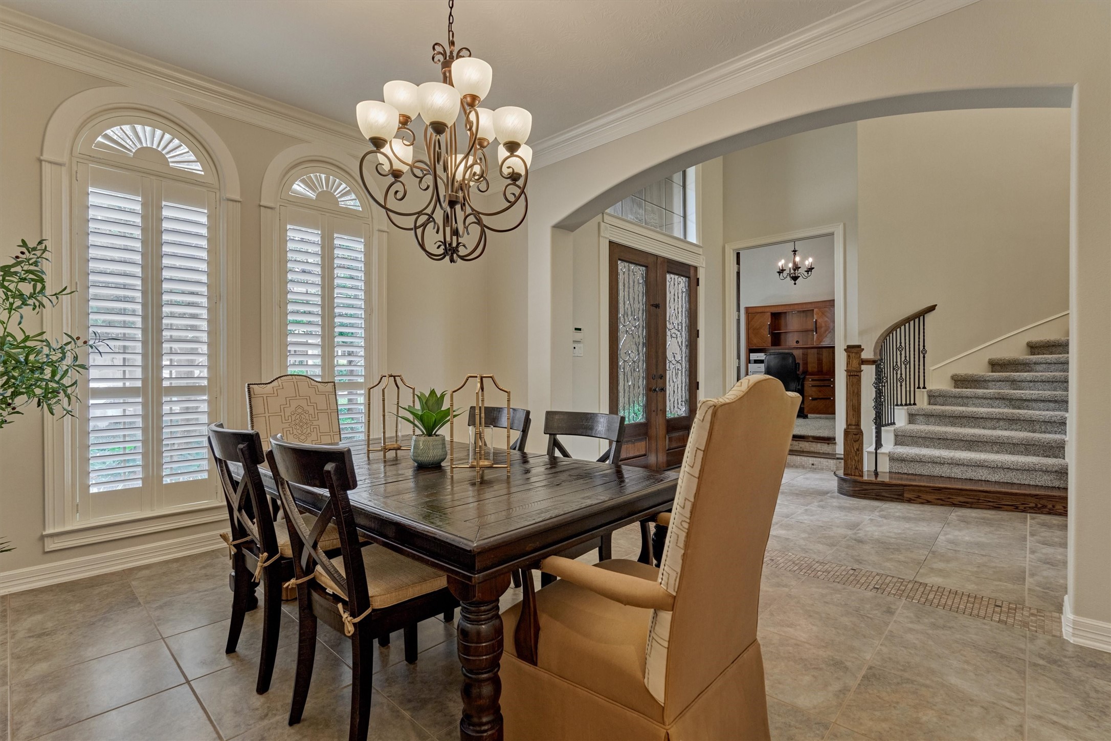 67 South Sage Sparrow Circle Spring, TX 77389 - Photo 15 of 49 a view of a dining room with furniture and chandelier