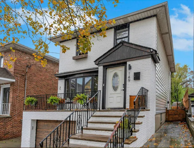 a front view of a house with balcony