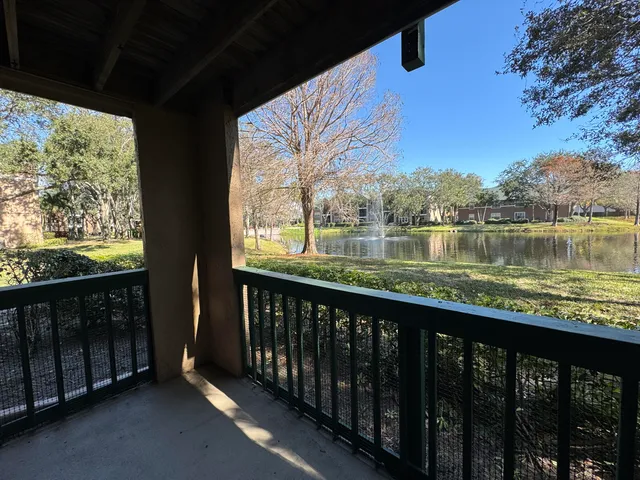 a view of a street from a balcony
