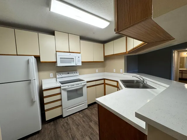 a kitchen view with cabinets and stainless steel appliances