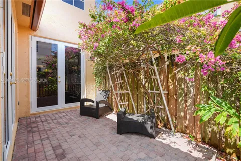 a building outdoor space with patio furniture