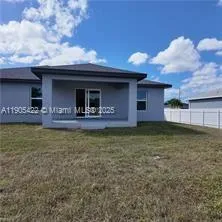 a view of a porch with a yard