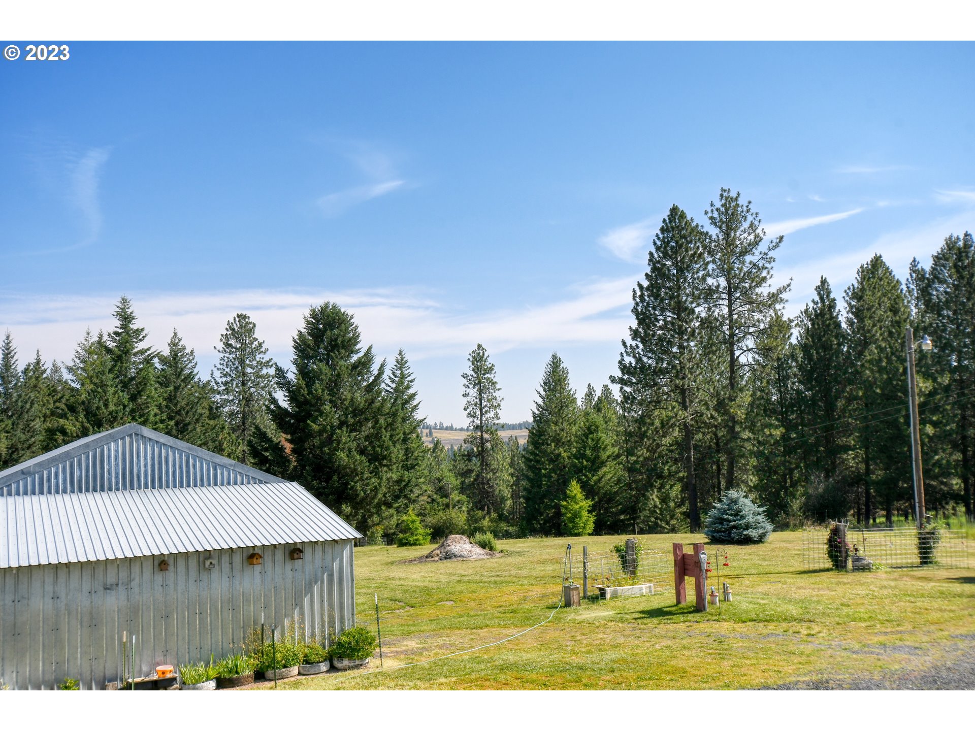 49414 County 1028 Road Pendleton, OR 97801 - Photo 16 of 48 a view of a house with a yard