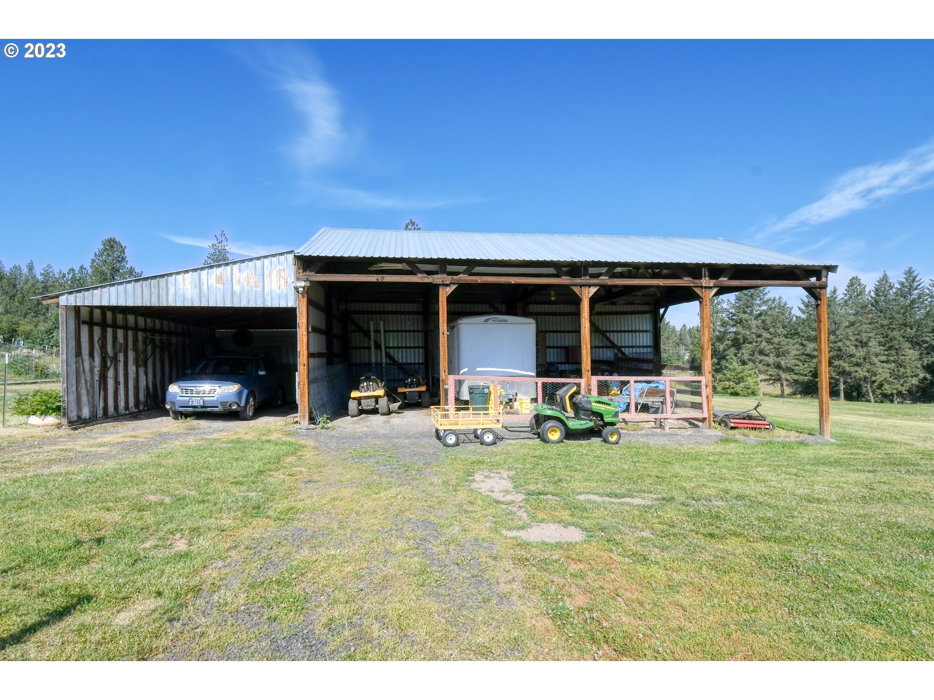 49414 County 1028 Road Pendleton, OR 97801 - Photo 31 of 48 a view of a house with backyard porch and sitting area